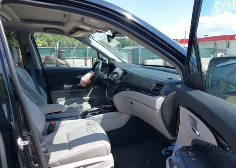 2019 Honda Pilot Touring z USA, uszkodzony, nr VIN 5FNYF6H69KB021253